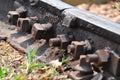 Closeup of train rail screws