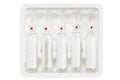 Closeup transparent glass ampoules with medicine in package isolated on white