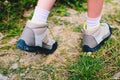 Closeup of trekking shoes of a mountain tourist