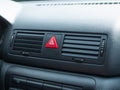 Closeup of triangle red accident Stop Emergency Light Button on Car dashboard plate Royalty Free Stock Photo