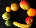 Closeup of Tropical fruits against black background