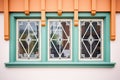 closeup of tudor window patterns and mullions Royalty Free Stock Photo