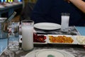 Closeup of Turkish raki and appetizers on table Royalty Free Stock Photo