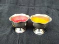 Turmeric and Kumkum Cup isolated on Black Background Royalty Free Stock Photo