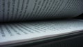 Closeup turning pages of book. Detailed view leafing book sheets Royalty Free Stock Photo