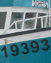 Closeup of turquoise and white fishing boat Royalty Free Stock Photo