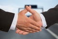 Closeup of two businessmen shaking hands Royalty Free Stock Photo