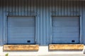 Closeup of two closed shutter on a loading dock Royalty Free Stock Photo