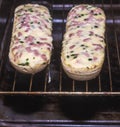 Closeup of two delicious baguette pizza cooking in the oven