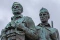 Closeup of two heads at Commando Memorial, Scotland. Royalty Free Stock Photo