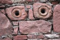 Closeup of two holes on a brick wall Royalty Free Stock Photo