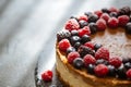 Two-layer cheesecake decorated with berries