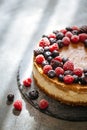 Two-layer cheesecake decorated with berries