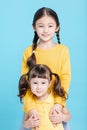 Closeup two little girls sisters hugging Royalty Free Stock Photo