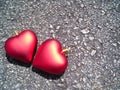 Closeup of two loving hearts
