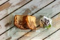 Closeup of two pieces of homemade biscuit cake and vanilla ice cream