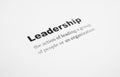 Closeup of a typed definition of the word leadership. Paper sheet