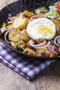 Tyrolean groestl with an egg Royalty Free Stock Photo