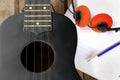 Closeup ukulele on a wooden floor. Royalty Free Stock Photo