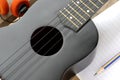 Closeup ukulele on a wooden floor. Royalty Free Stock Photo