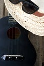 Closeup ukulele on a wooden floor. Royalty Free Stock Photo