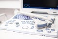 Closeup Ultrasound scanner equipmentin in clinic hospital. Diagnostics, sonography and health concept. Copyspace