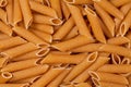 Closeup of uncooked wholewheat pasta