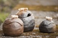 Closeup of unique handmade three pots with wooden details Royalty Free Stock Photo