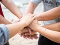 Closeup United hands on the sea background. Friendship, Teamwork