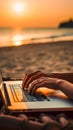 Closeup of unrecognizable digital nomad typing on laptop at the beach showcasing the concept of making money online