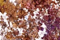 Closeup of unrefined chalcopyrite mineral and ore, pattern background
