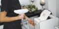 closeup up view of a cosmetologist turning on a laser cleaning machine at the spa