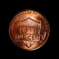 Closeup of a 1 US dollar cent coin also called penny from 2016 isolated on a black background Royalty Free Stock Photo