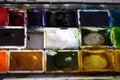 Closeup of a used paintbox