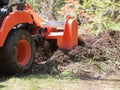 Closeup of a Utility Tractor With Tiller in Action Royalty Free Stock Photo