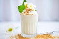 closeup vanilla shake with cookie crumbles on whipped cream