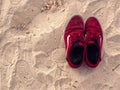 Closeup of Vans shoes on Mexican beach