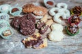 Traditional homemade Christmas cookies: Variety of sweet European cookies on rustic wooden desk, powdered sugar