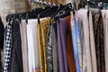 Closeup of various autumn and winter scarfs in the store Royalty Free Stock Photo