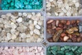 Closeup of various colorful stones quartz, marbles, ore minerals, gems