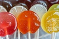 closeup of various fruitflavored lollipops in a row Royalty Free Stock Photo