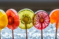 closeup of various fruitflavored lollipops in a row Royalty Free Stock Photo