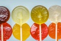 closeup of various fruitflavored lollipops in a row Royalty Free Stock Photo