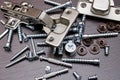 Closeup of various furniture fittings. Furniture assembly kit, Concealed hinge and various screws