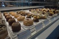 Closeup of various sweet Pastries and cakes in a showcase at a shop