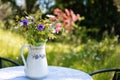 Closeup of a vase of a wildflowers on a table Royalty Free Stock Photo