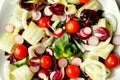 Raw ,vegan salad on a white background