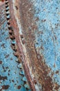 Closeup vertical detail of small rusty