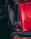 Closeup vertical shot of retro classic car backlight details
