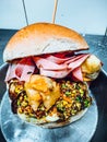 Closeup vertical shot of a tasty looking big burger